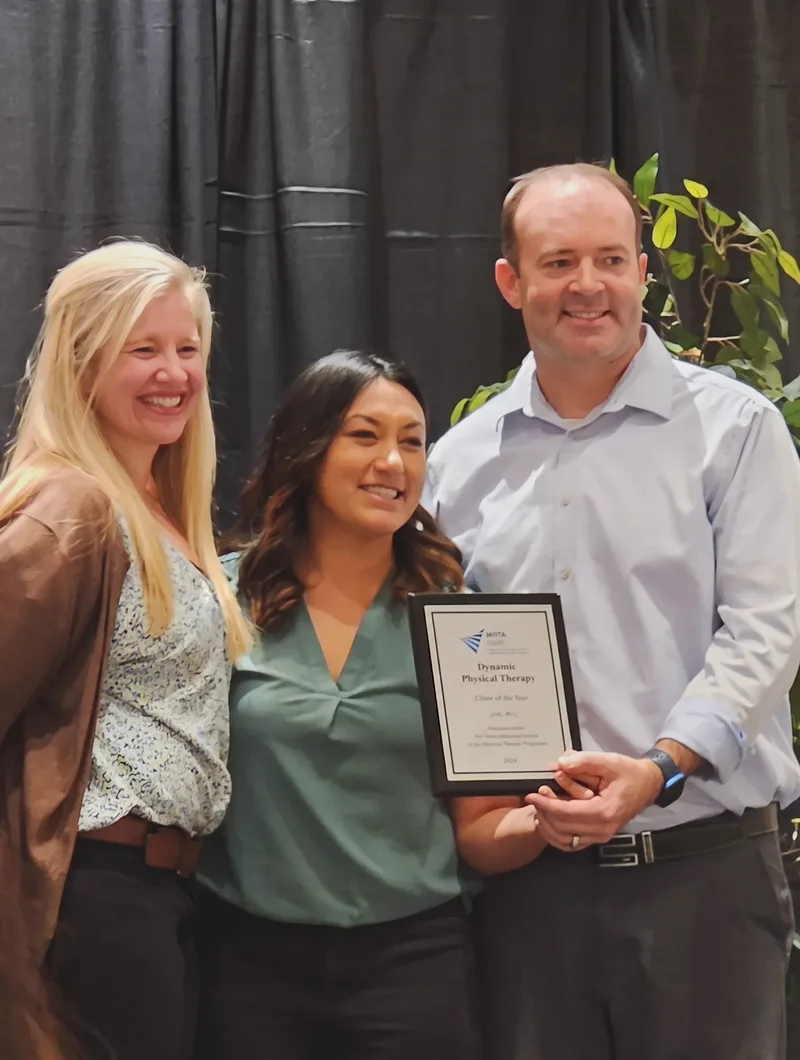 The Dynamic Physical Therapy team accepting the Utah Physical Therapy Association's Clinic of the Year award